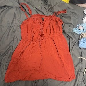 Dark orange flowy top